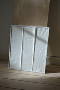 Le Petit Plissé off-white — hand-pleated recovered cotton wall hanging — h o n e Paris